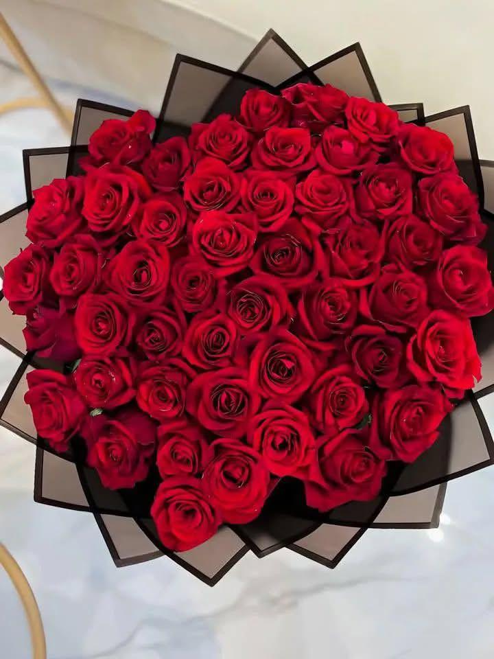 Professional floral arrangement in modern corporate setting